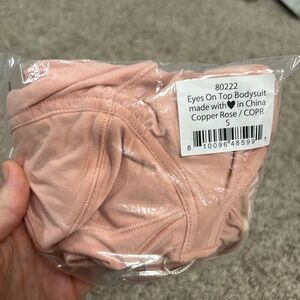 We are hah eyes on top bodysuit in copper rose small